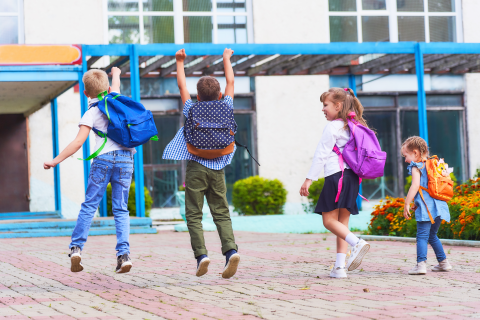 happy-students-jump-around-school-daqy-maximize-principal-potential